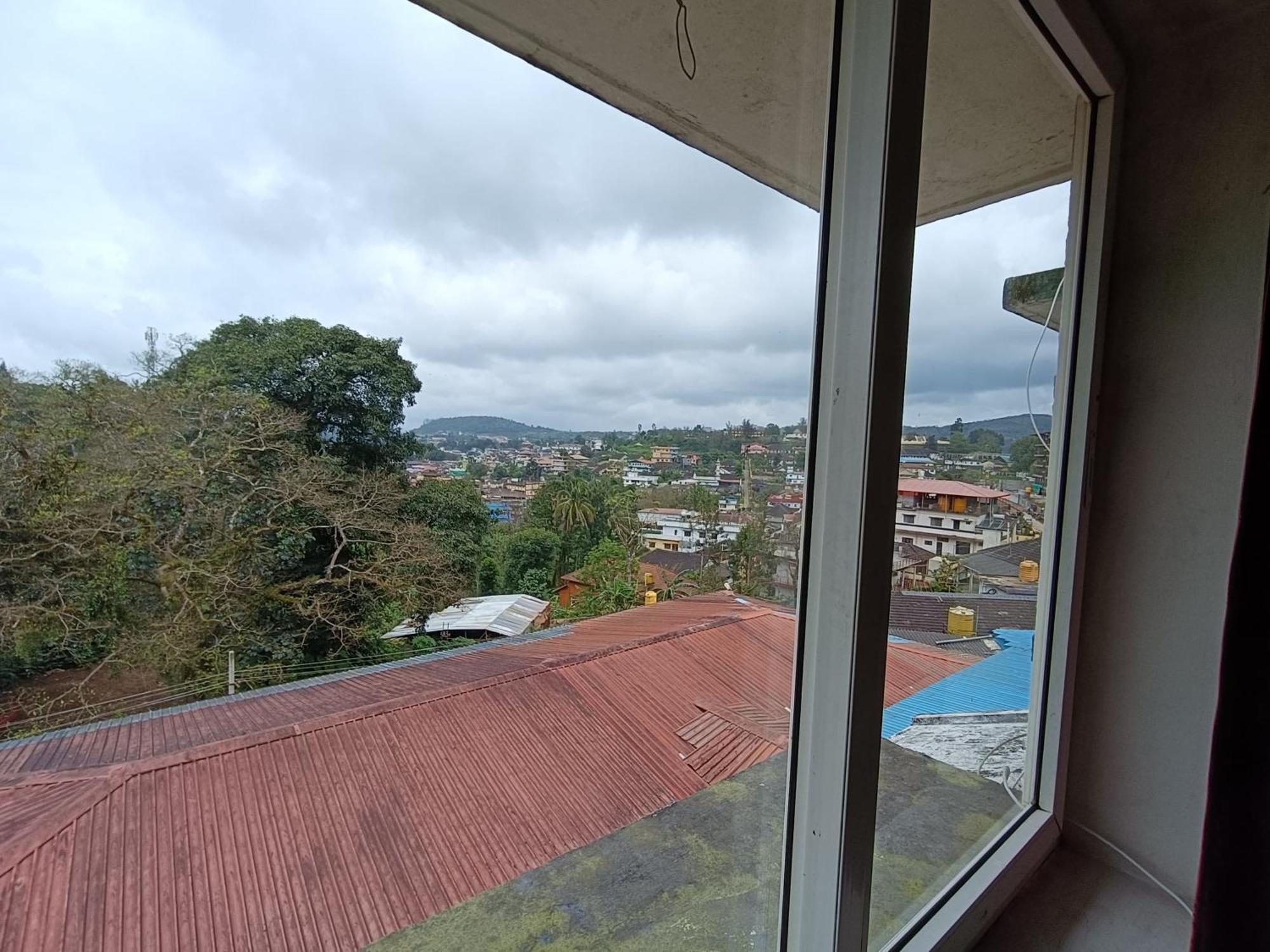 Hotel New Rajdarshan Madikeri Buitenkant foto