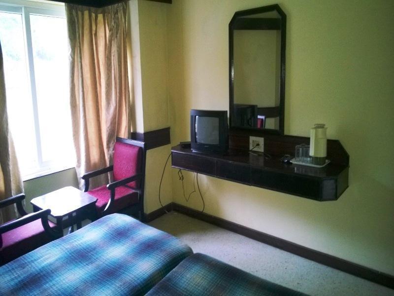 Hotel New Rajdarshan Madikeri Buitenkant foto